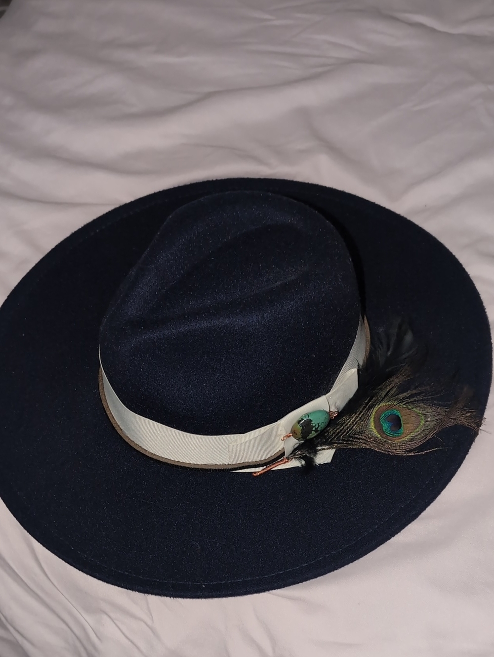 Women's Navy Cowboy Hat with Ivory Band and Peacock Feather